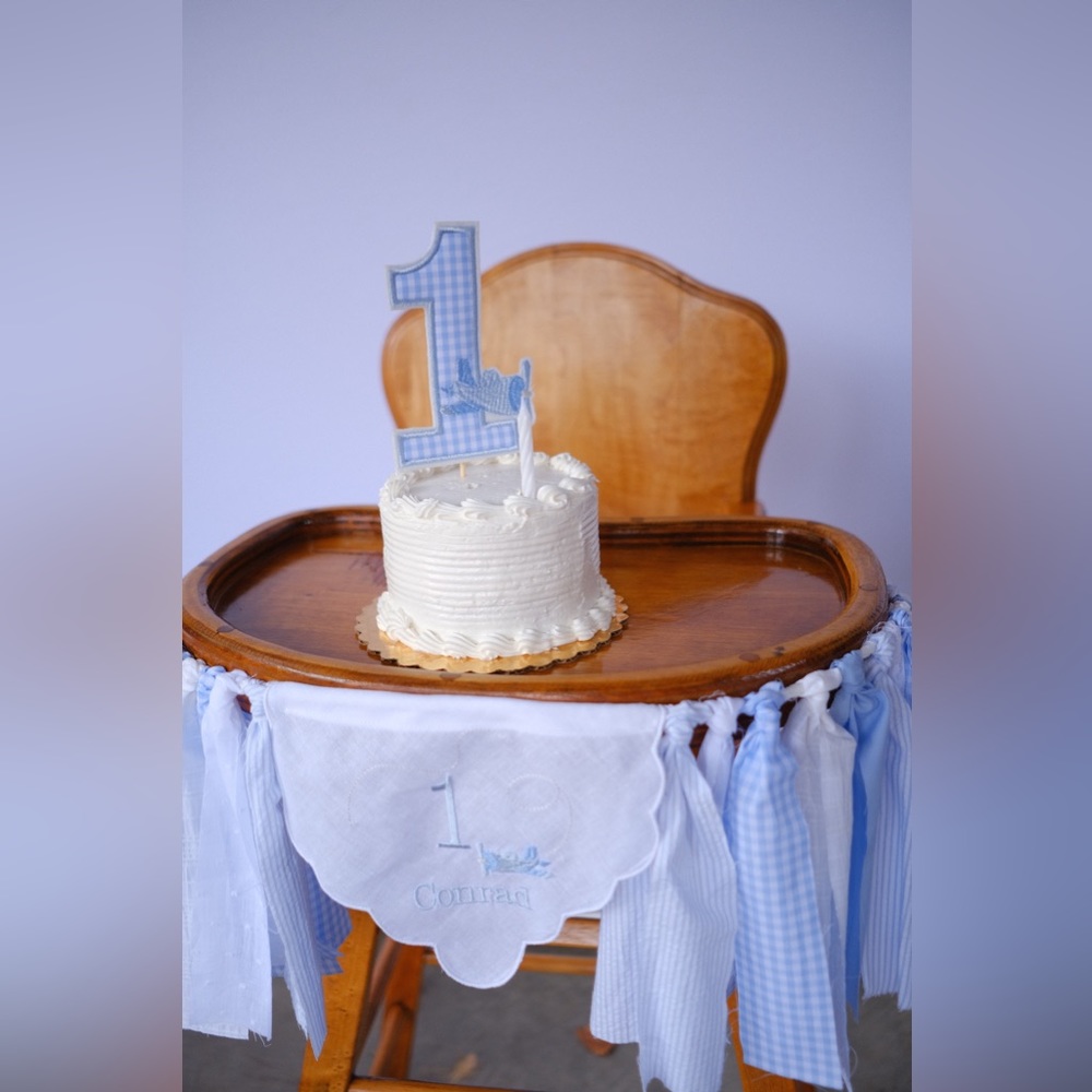 “Conrad” first birthday high chair banner and cake topper